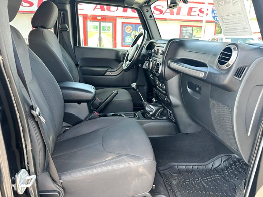 2016 Jeep Wrangler - $16,999
