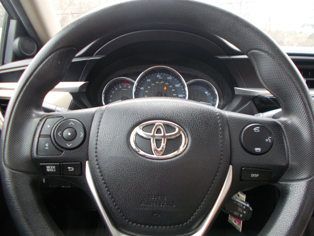 2015 Toyota Corolla - $12,000