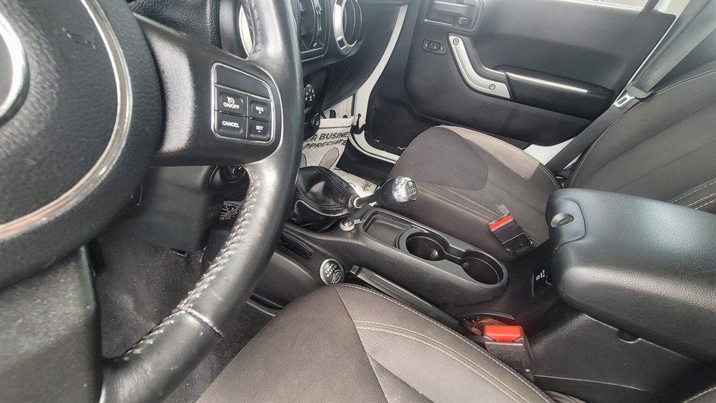 2016 Jeep Wrangler - $15,775