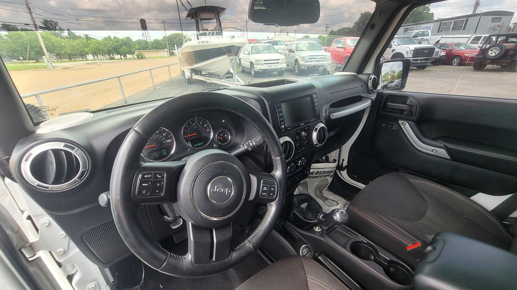 2016 Jeep Wrangler - $15,775