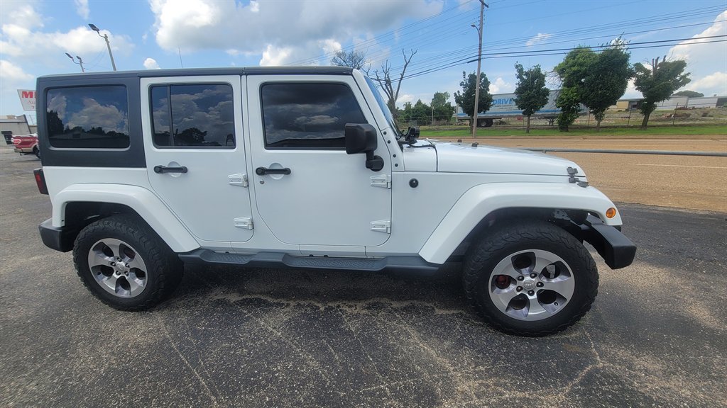 2016 Jeep Wrangler - $15,775