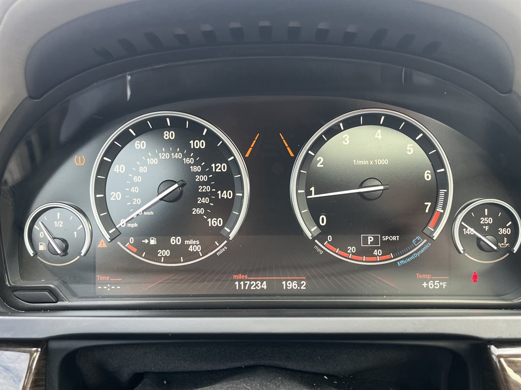 2011 BMW 740i - $5,999