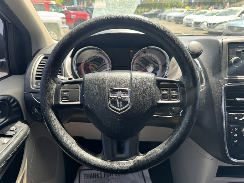 2015 Dodge Grand Caravan - $10,880