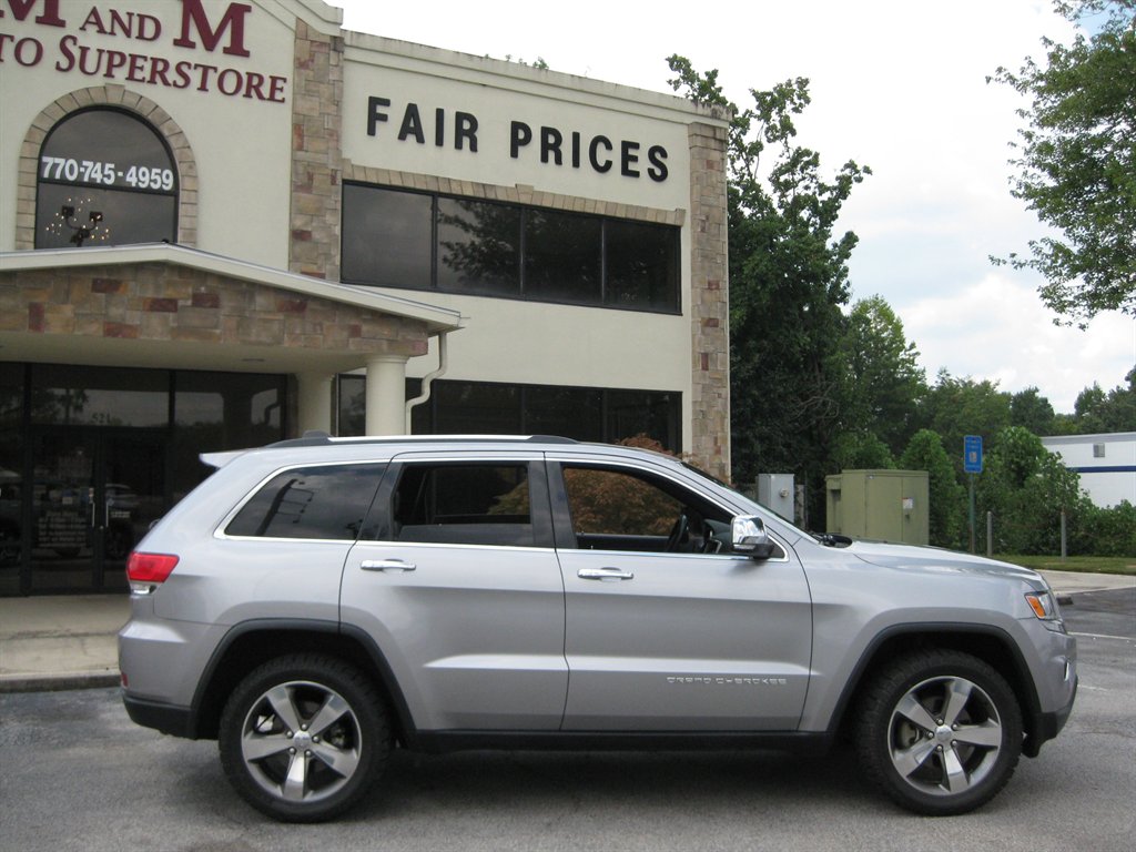 2015 Jeep Cherokee - $9,500