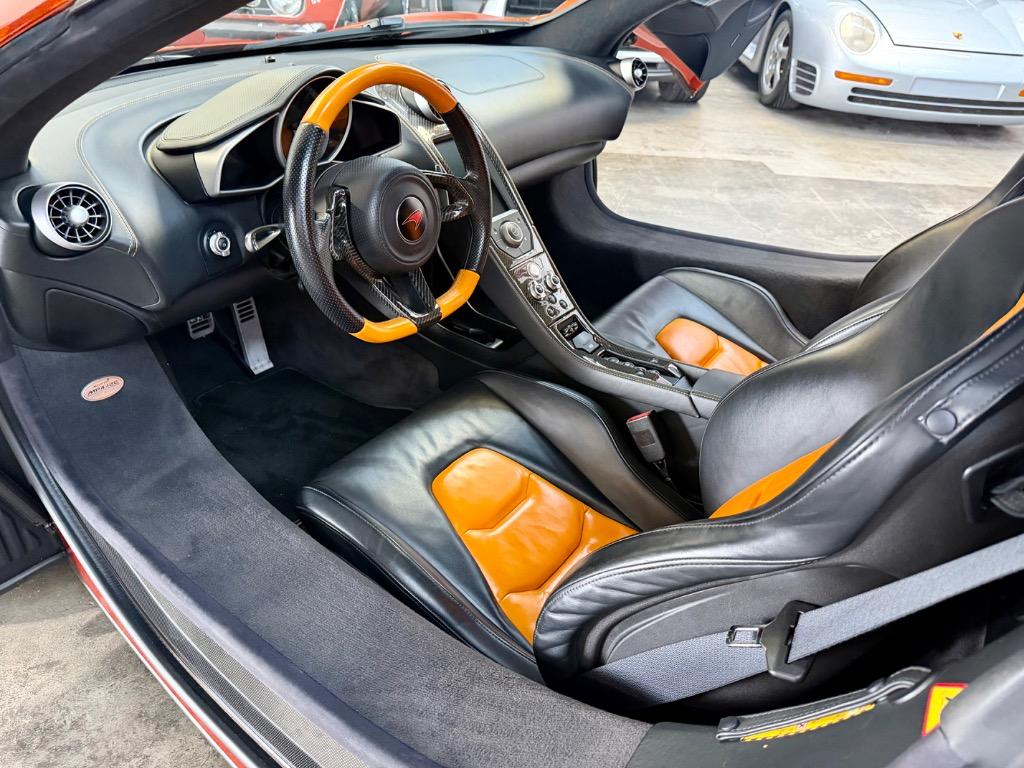 2012 McLaren MP4-12C - $109,995
