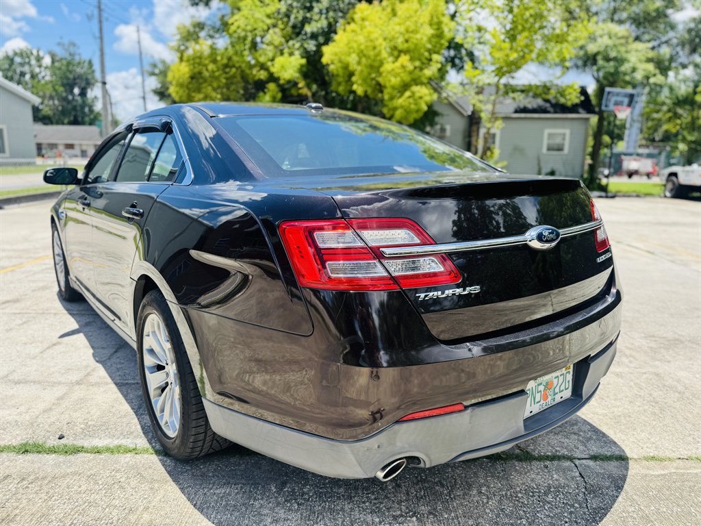 2014 Ford Taurus - $7,999