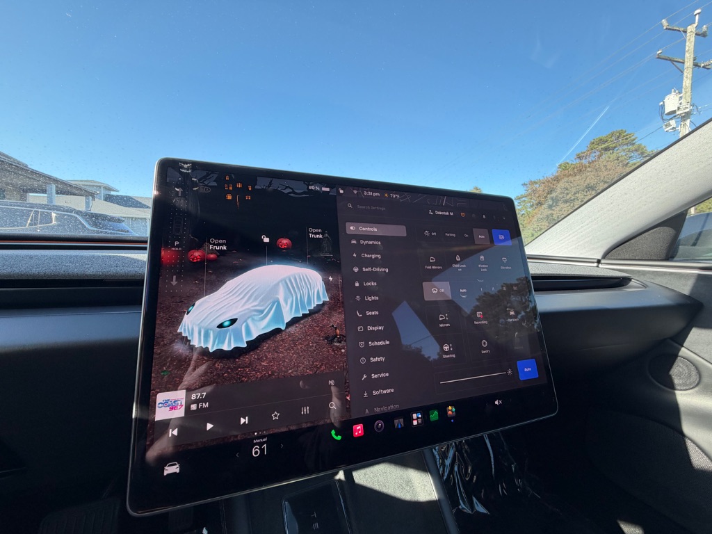 2024 Tesla Model 3 - $31,999
