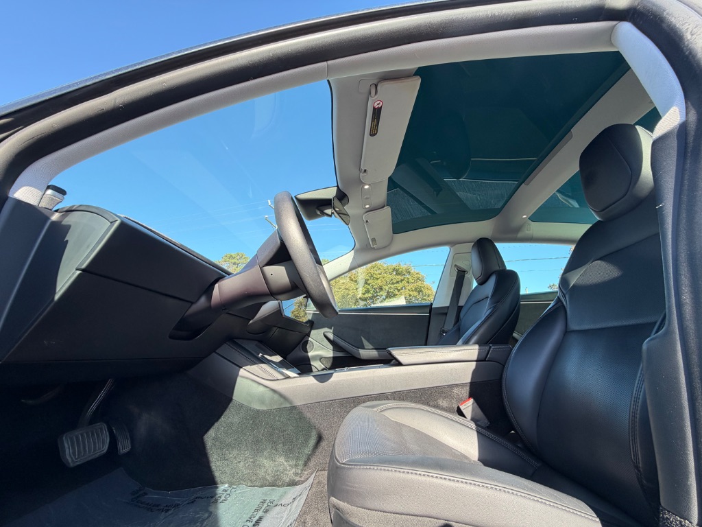 2024 Tesla Model 3 - $31,999