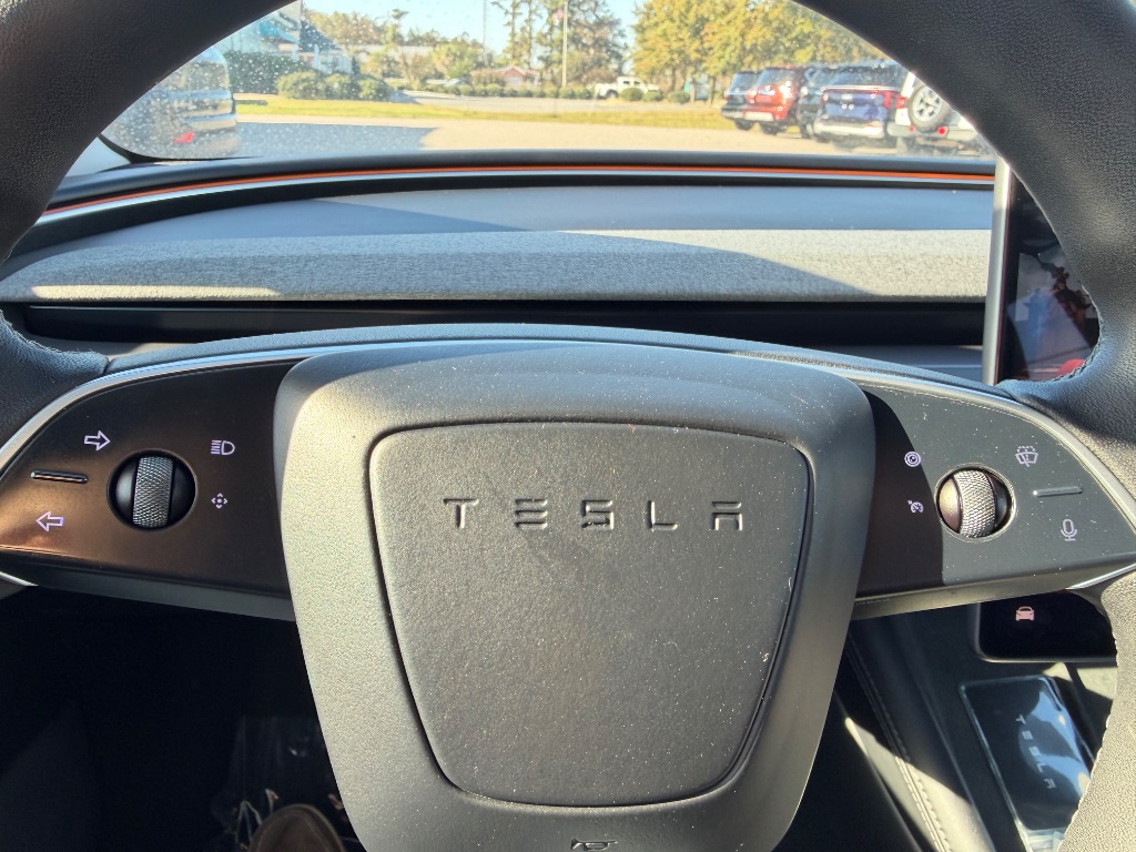 2024 Tesla Model 3 - $31,999