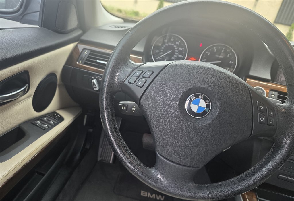 2011 BMW 328i - $10,436