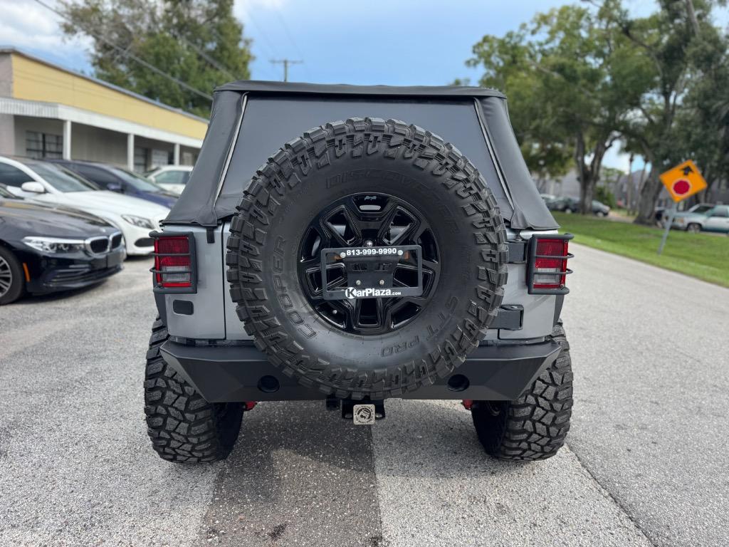 2016 Jeep Wrangler - $13,398