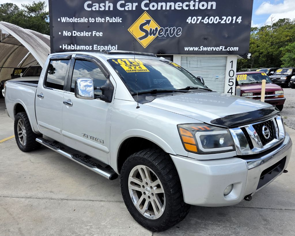 Silver 2014 Nissan Titan Pickup Truck Four-Wheel Drive Automatic