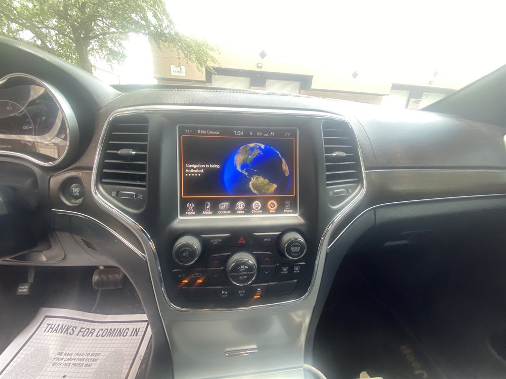2014 Jeep Cherokee - $18,000
