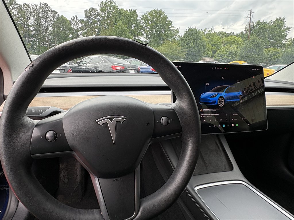 2022 Tesla Model 3 - $17,523