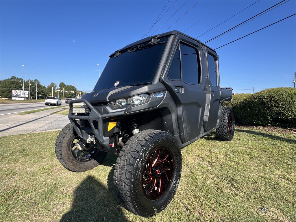 2021 Can-am Defender/traxter - $34,999