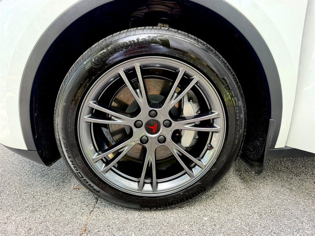 2024 Tesla Model Y - $38,999