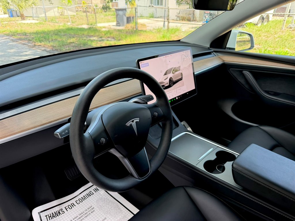 2024 Tesla Model Y - $38,999