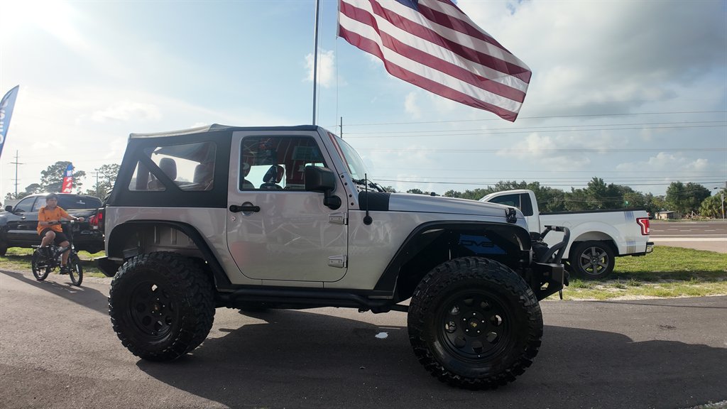 2016 Jeep Wrangler - $17,878
