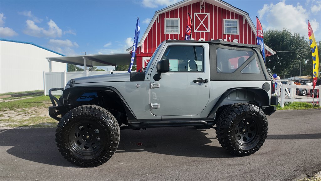 2016 Jeep Wrangler - $17,878
