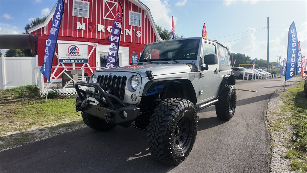 2016 Jeep Wrangler - $17,878