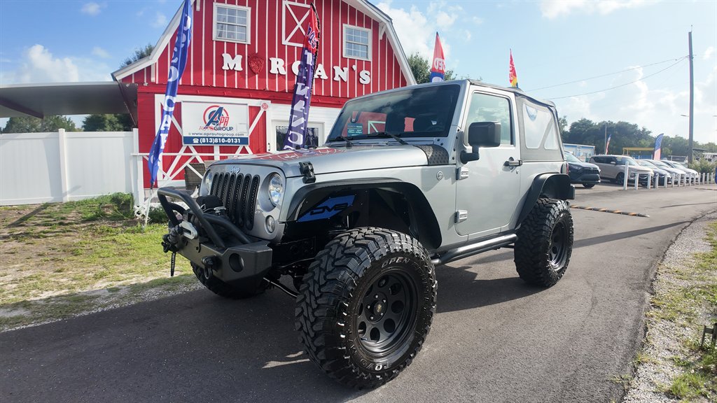2016 Jeep Wrangler - $17,878