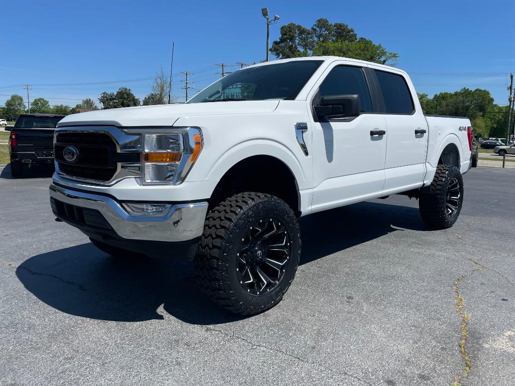 2022 Ford F150 XLT/ 6in Lift On 35s photo