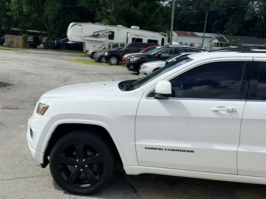 2014 Jeep Cherokee - $12,495