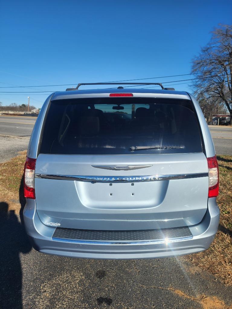 2013 Chrysler Town & Country - $10,495