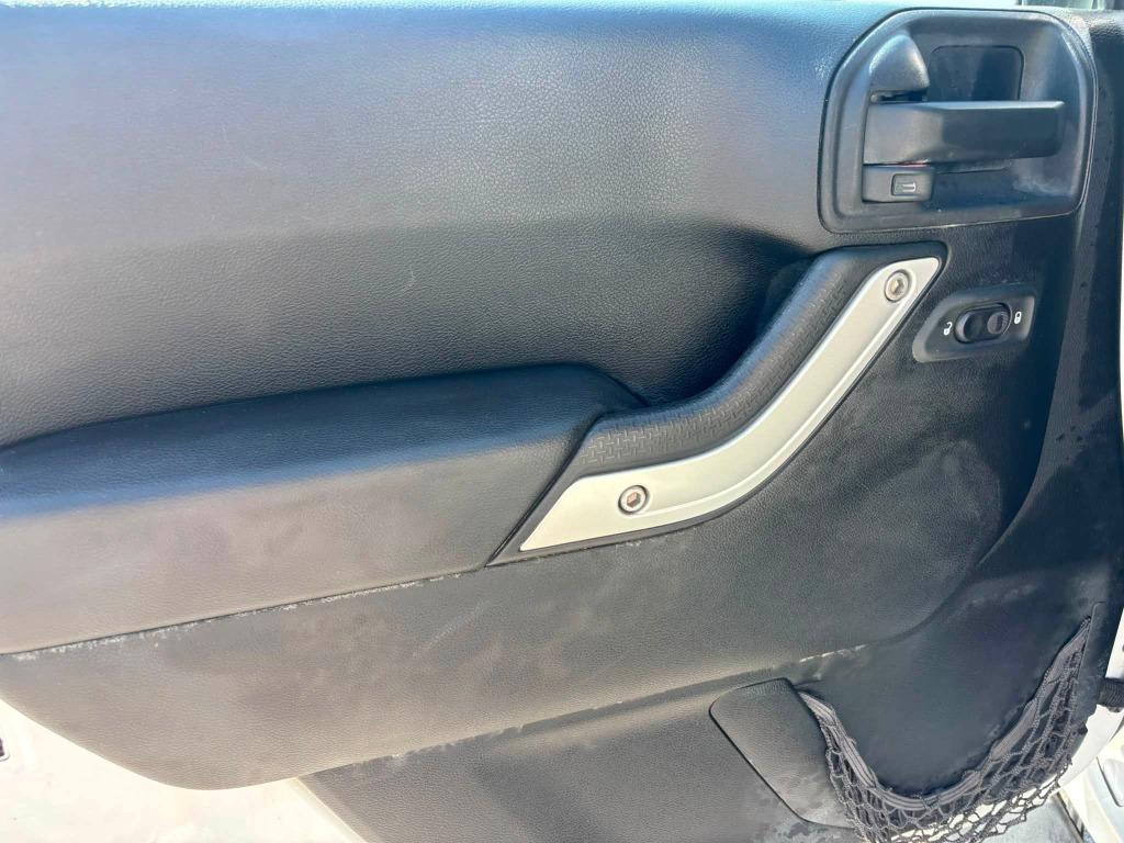 2014 Jeep Wrangler - $18,473