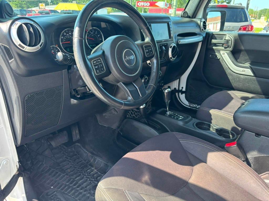 2014 Jeep Wrangler - $18,473