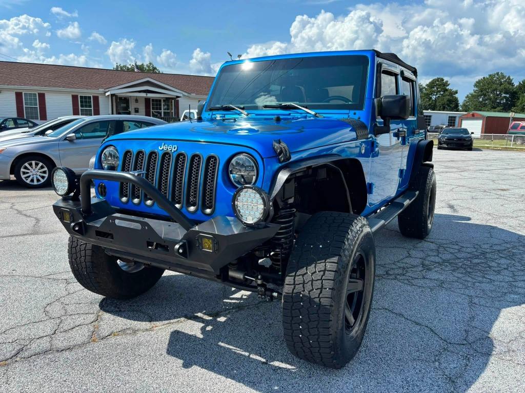 2016 Jeep Wrangler - $17,473