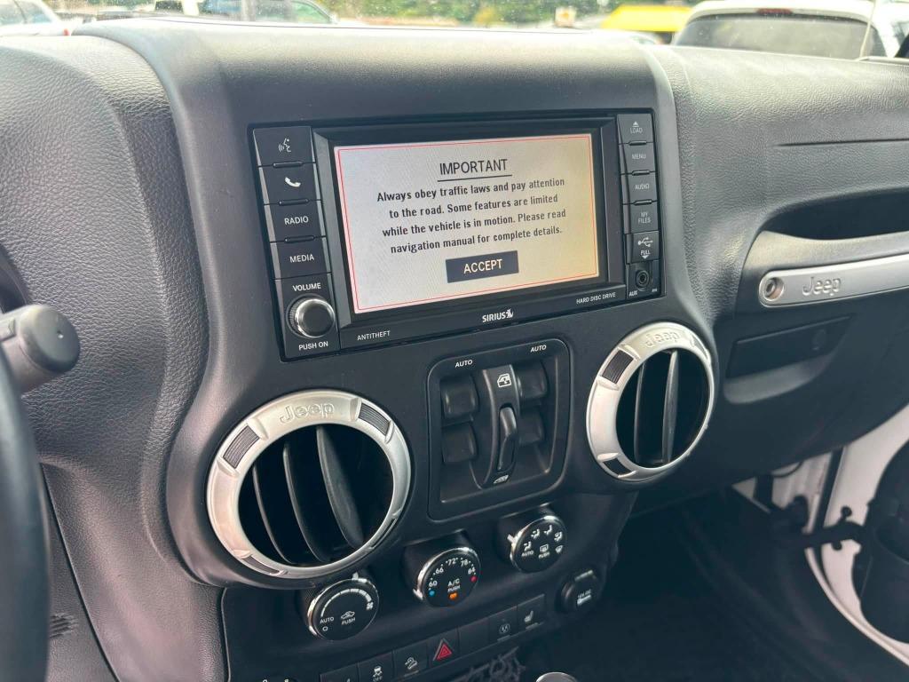 2015 Jeep Wrangler - $15,473