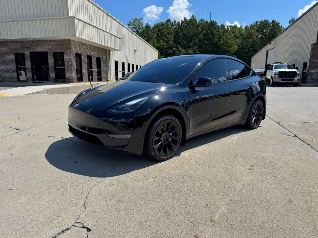 2023 Tesla Model Y - $36,000