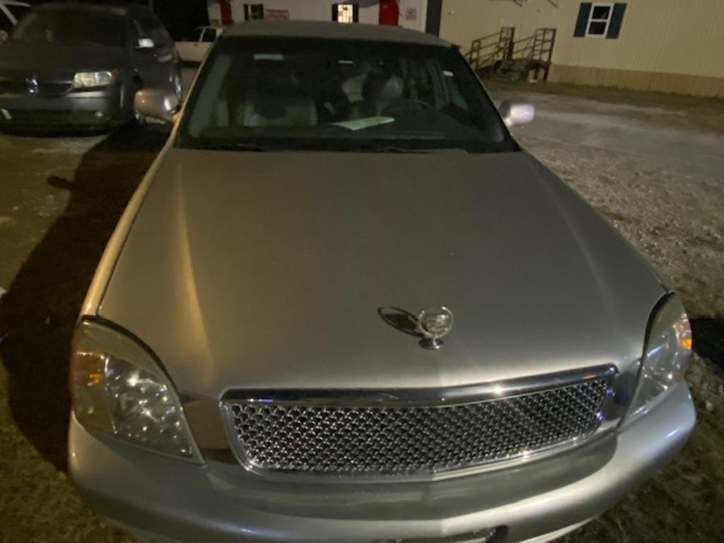 2001 Cadillac DeVille - $4