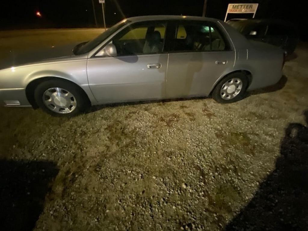 2001 Cadillac DeVille - $4