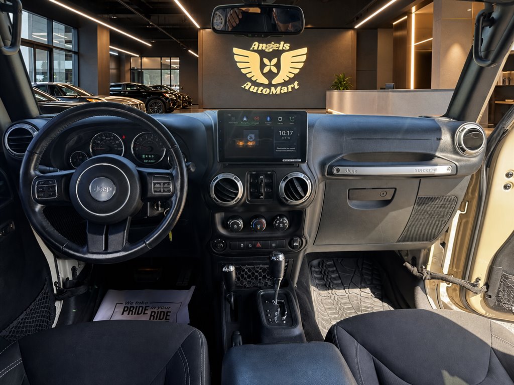 2016 Jeep Wrangler - $18,995