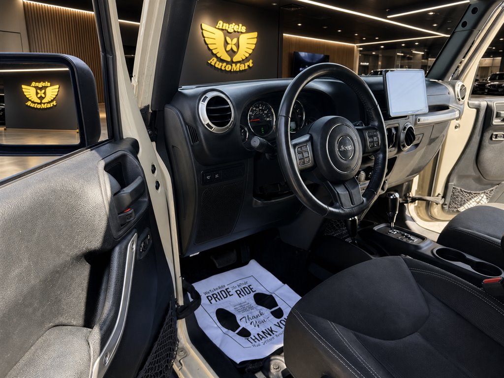 2016 Jeep Wrangler - $18,995