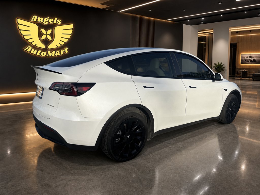 2023 Tesla Model Y - $34,995