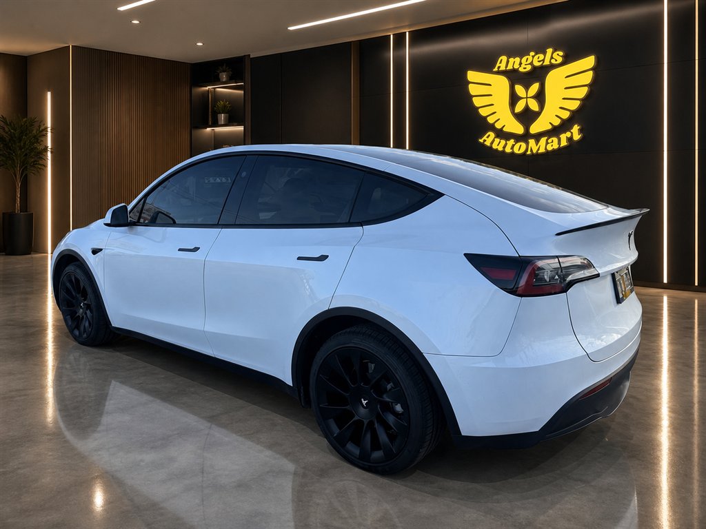 2023 Tesla Model Y - $34,995