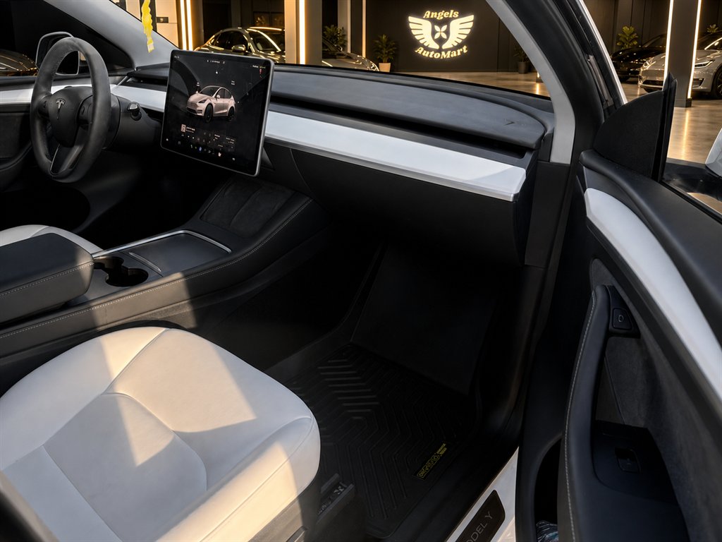 2023 Tesla Model Y - $34,995