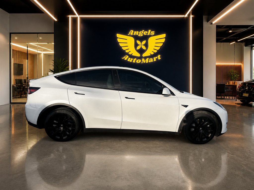 2023 Tesla Model Y - $34,995