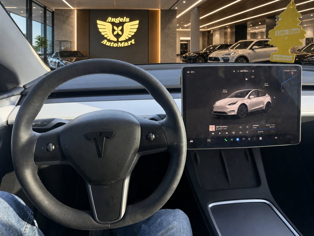 2023 Tesla Model Y - $34,995