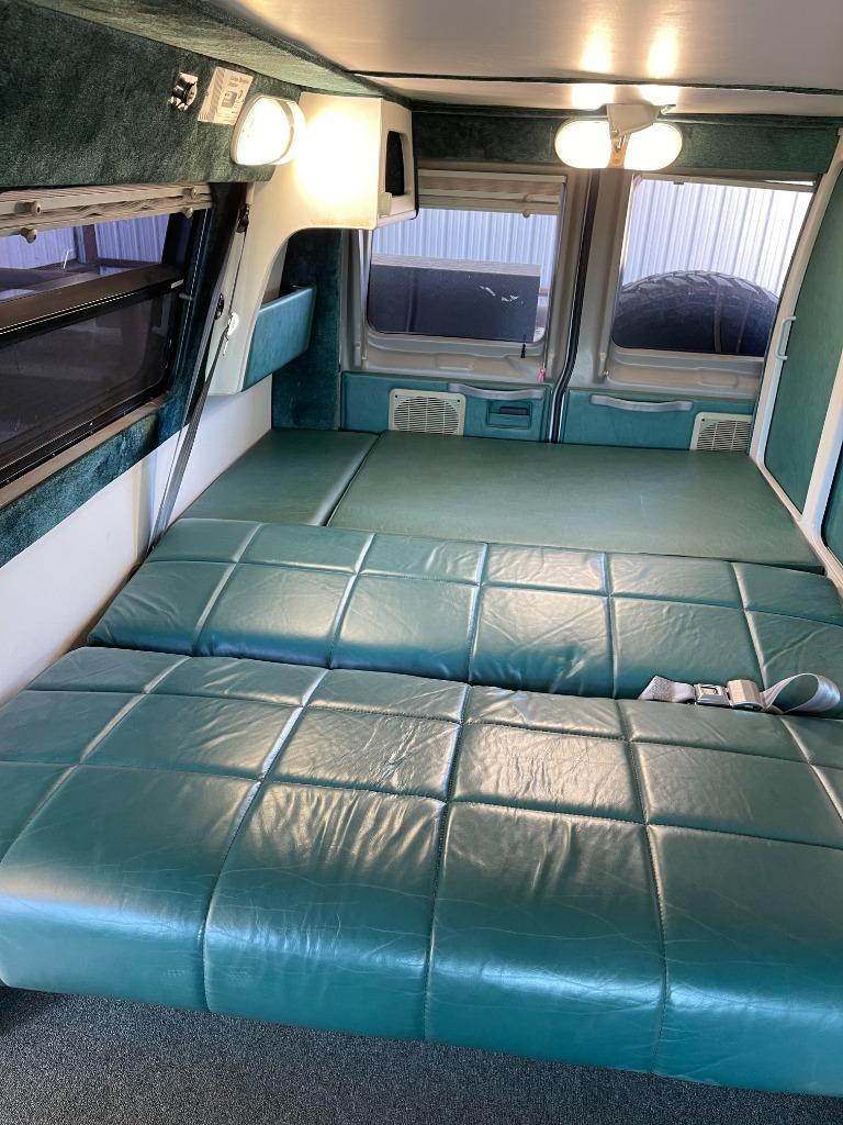 2001 Ford E-350 - $125,000