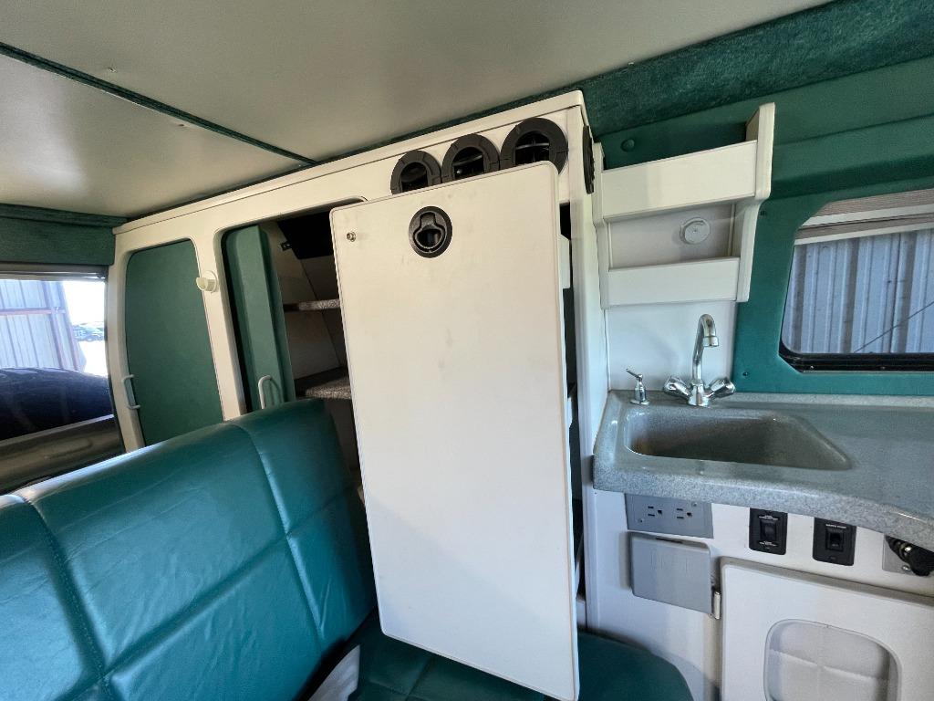 2001 Ford E-350 - $125,000