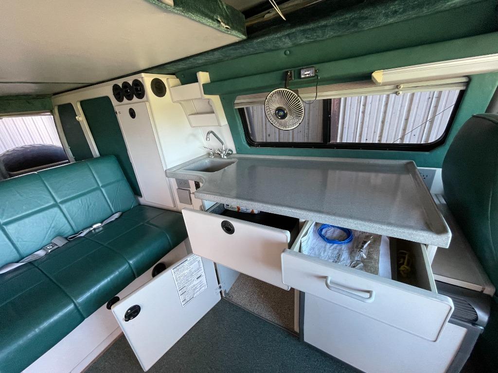 2001 Ford E-350 - $125,000