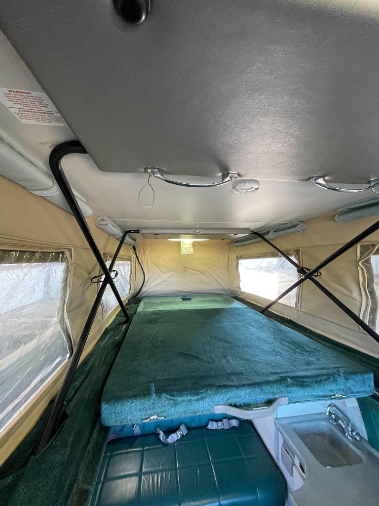 2001 Ford E-350 - $125,000