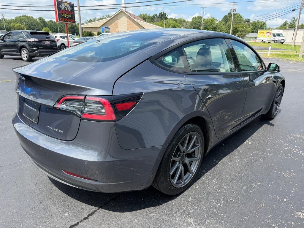 2022 Tesla Model 3 - $15,998
