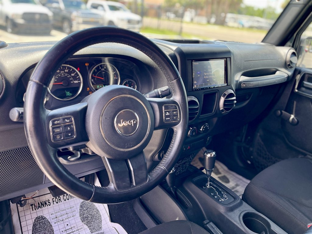 2015 Jeep Wrangler - $16,998