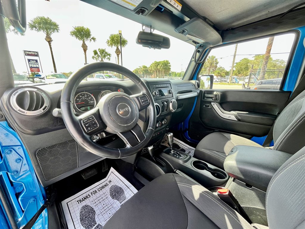 2015 Jeep Wrangler - $12,998