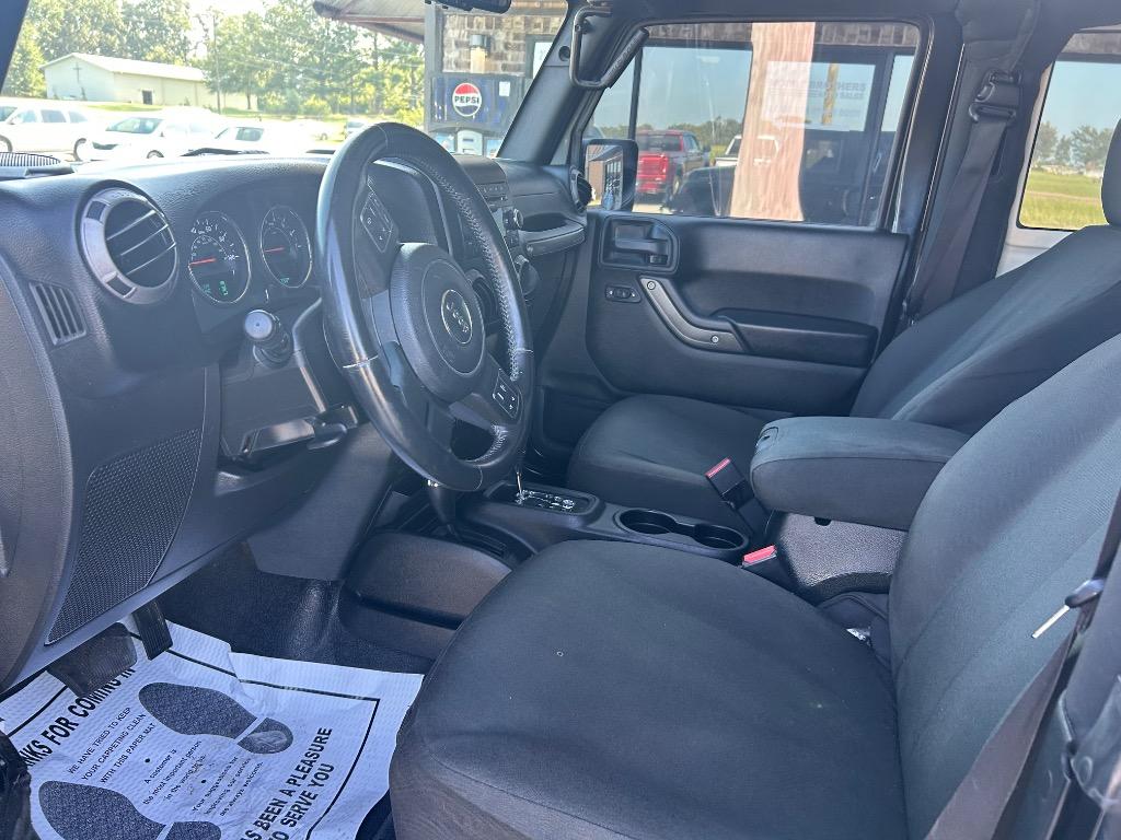 2016 Jeep Wrangler - $17,990